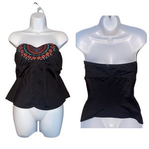 Tankini top with embellishments.
